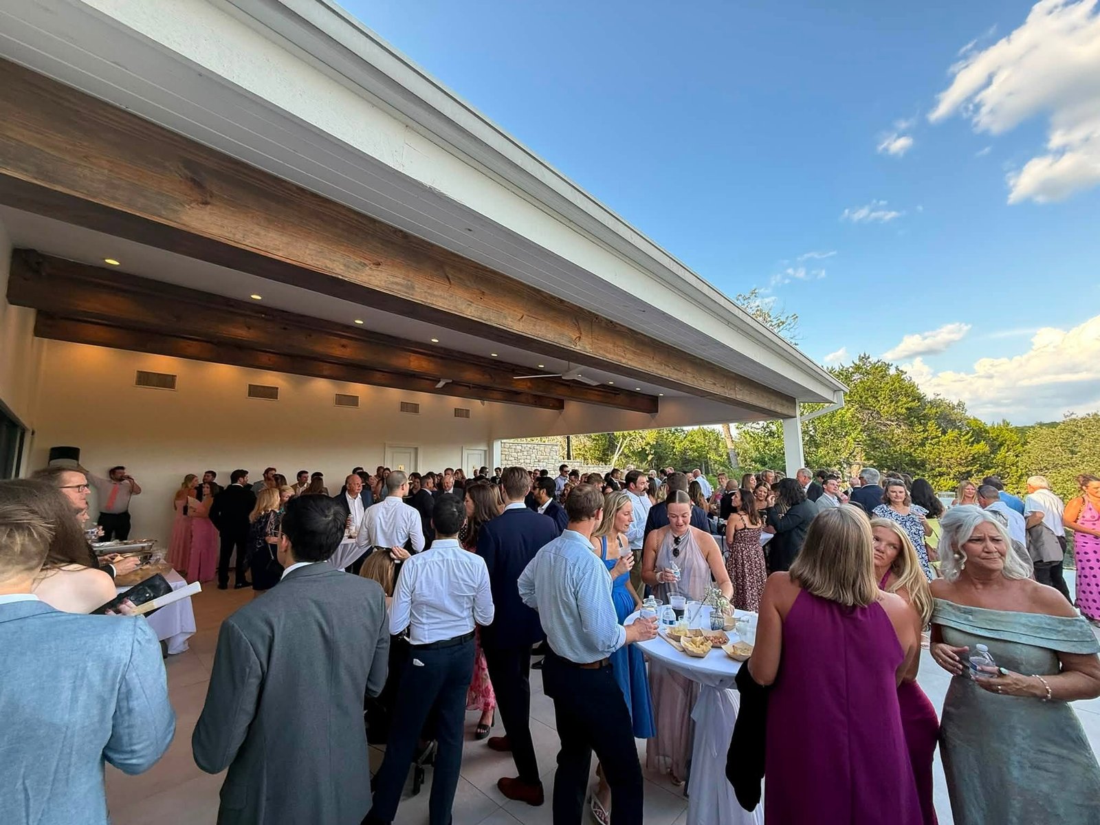 Wedding guests enjoying cocktail hour